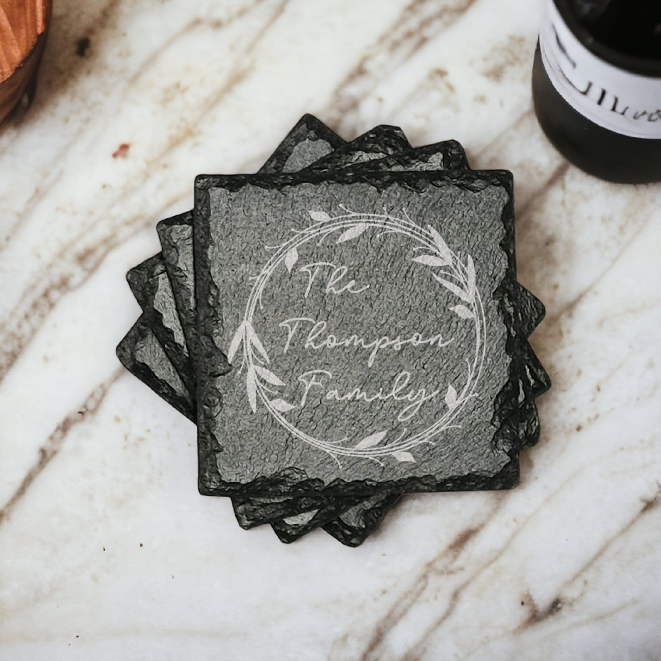 Family name monogram (Style 1) on set of 4 slate coasters with font of your choice