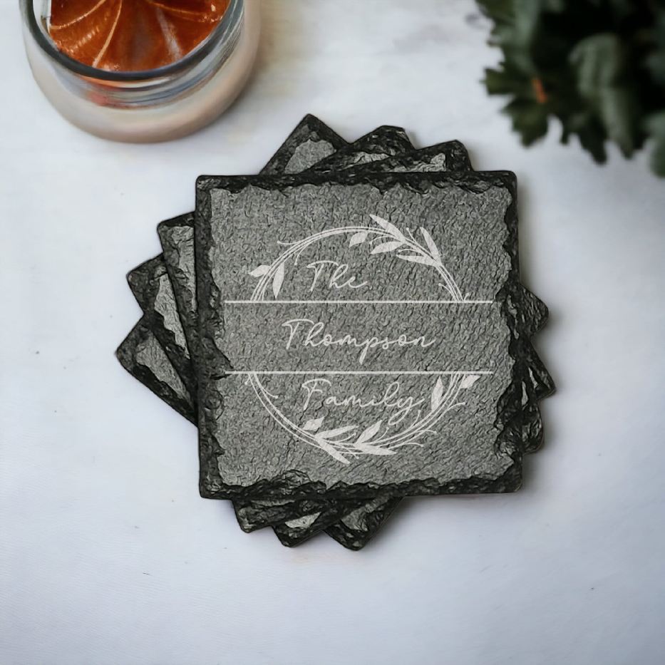 Family name monogram (Style 2) on set of 4 slate coasters with font of your choice