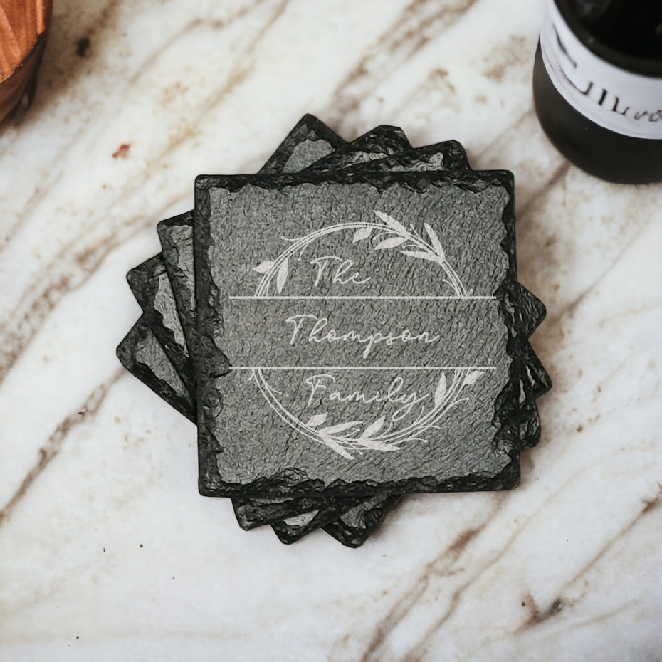 Family name monogram (Style 2) on set of 4 slate coasters with font of your choice