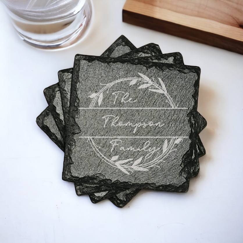 Family name monogram (Style 2) on set of 4 slate coasters with font of your choice