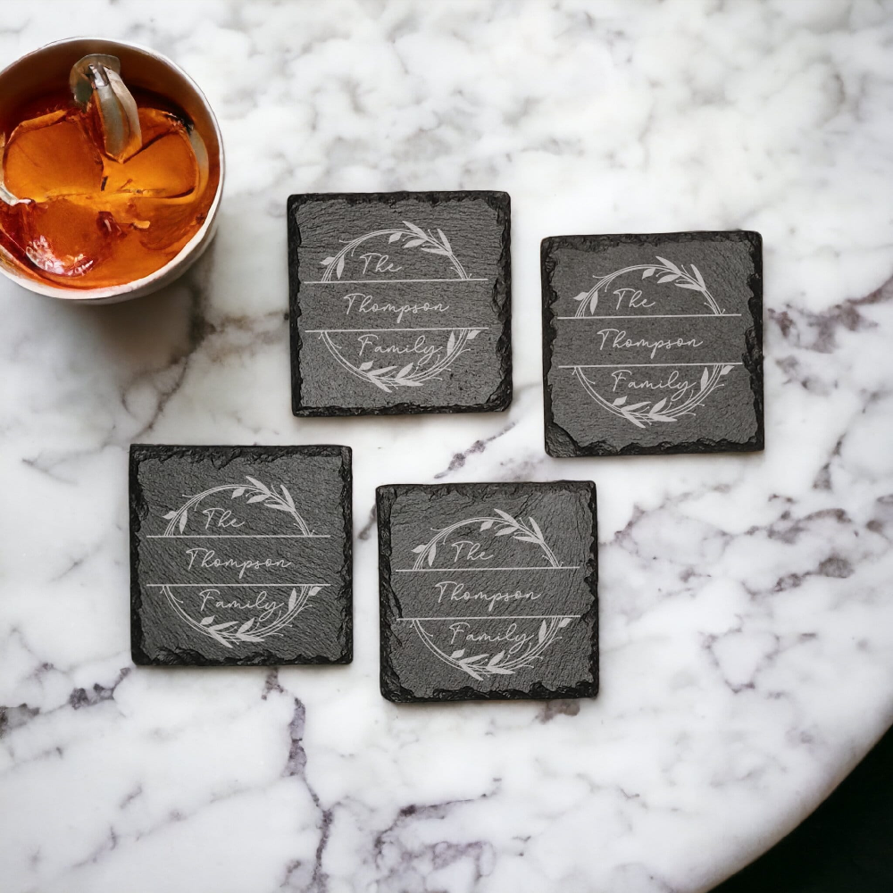 Family name monogram (Style 2) on set of 4 slate coasters with font of your choice