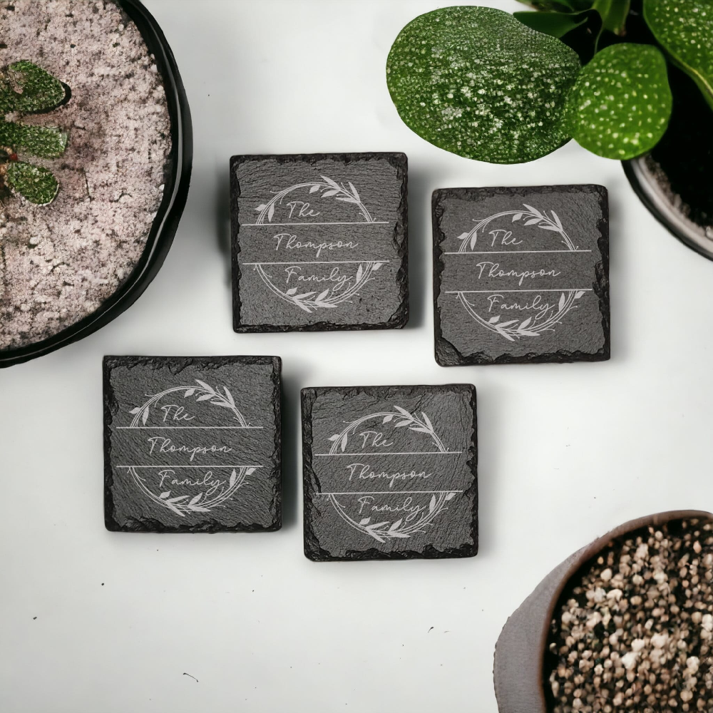 Family name monogram (Style 2) on set of 4 slate coasters with font of your choice