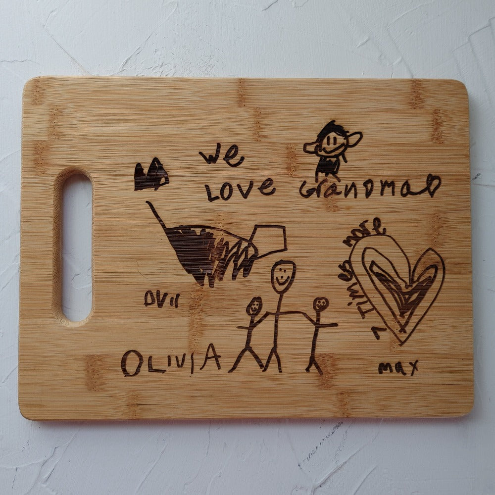 Cutting board engraved with Kid's art or drawings