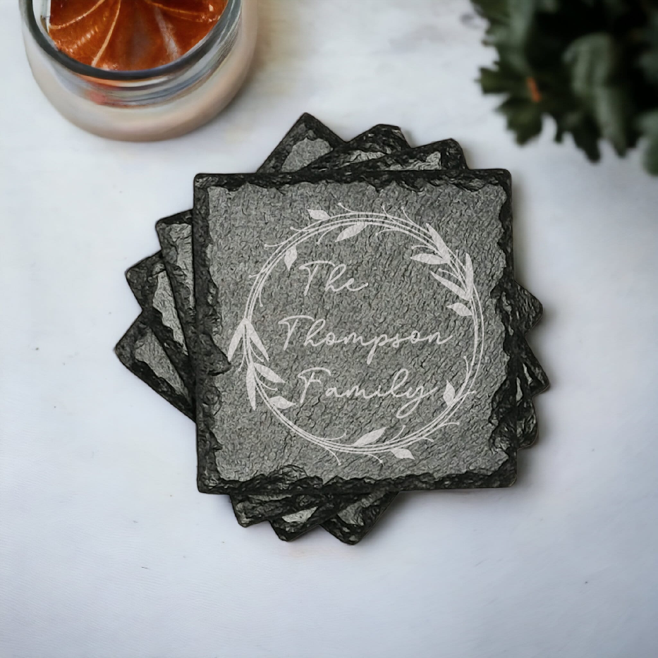 Family name monogram (Style 1) on set of 4 slate coasters with font of your choice