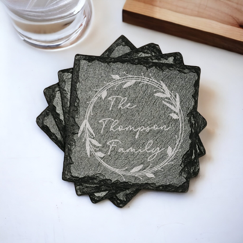 Family name monogram (Style 1) on set of 4 slate coasters with font of your choice