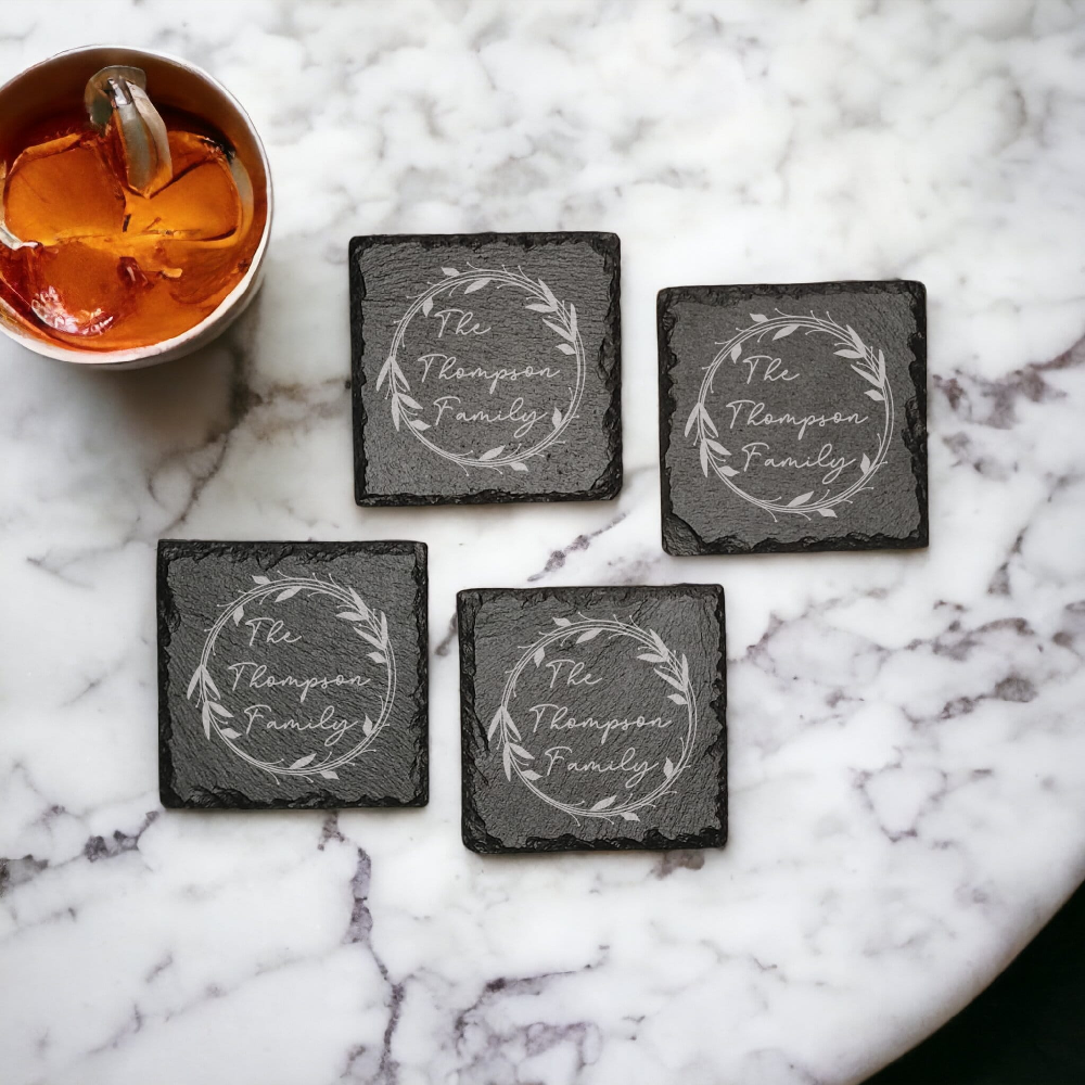 Family name monogram (Style 1) on set of 4 slate coasters with font of your choice