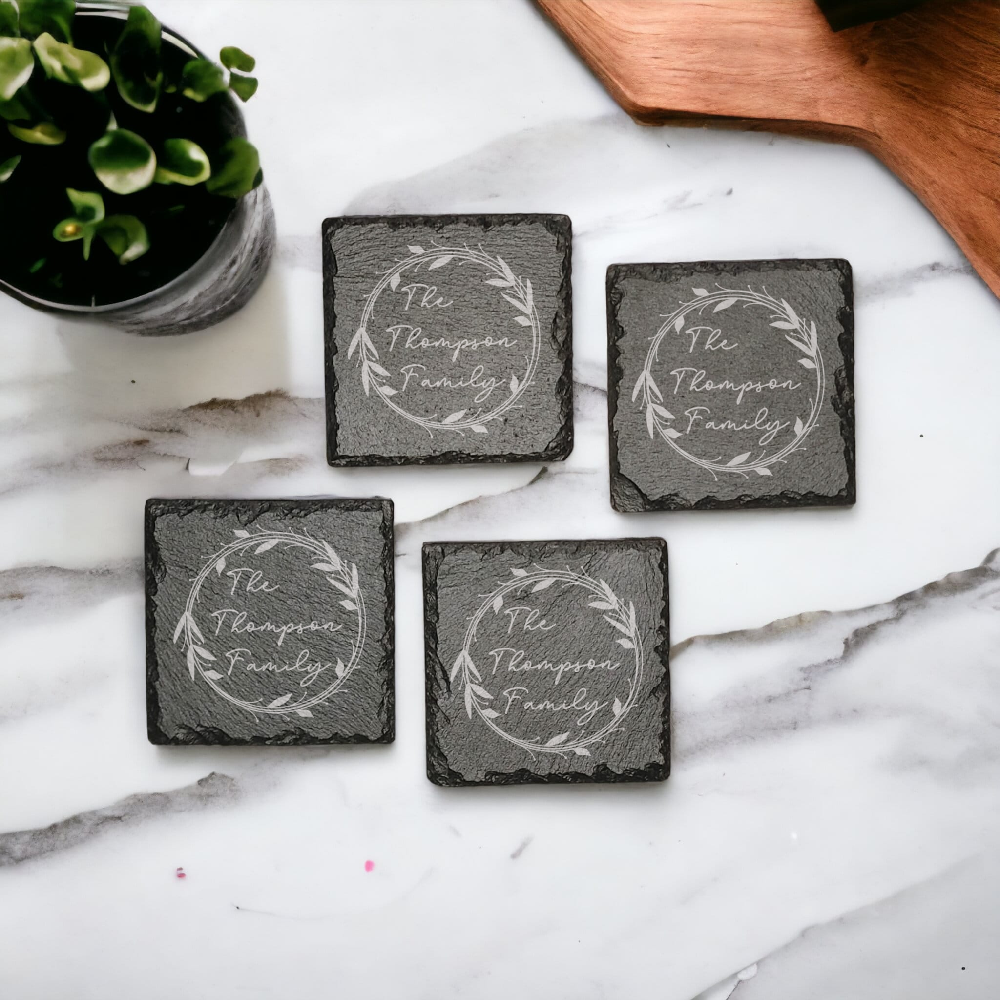 Family name monogram (Style 1) on set of 4 slate coasters with font of your choice