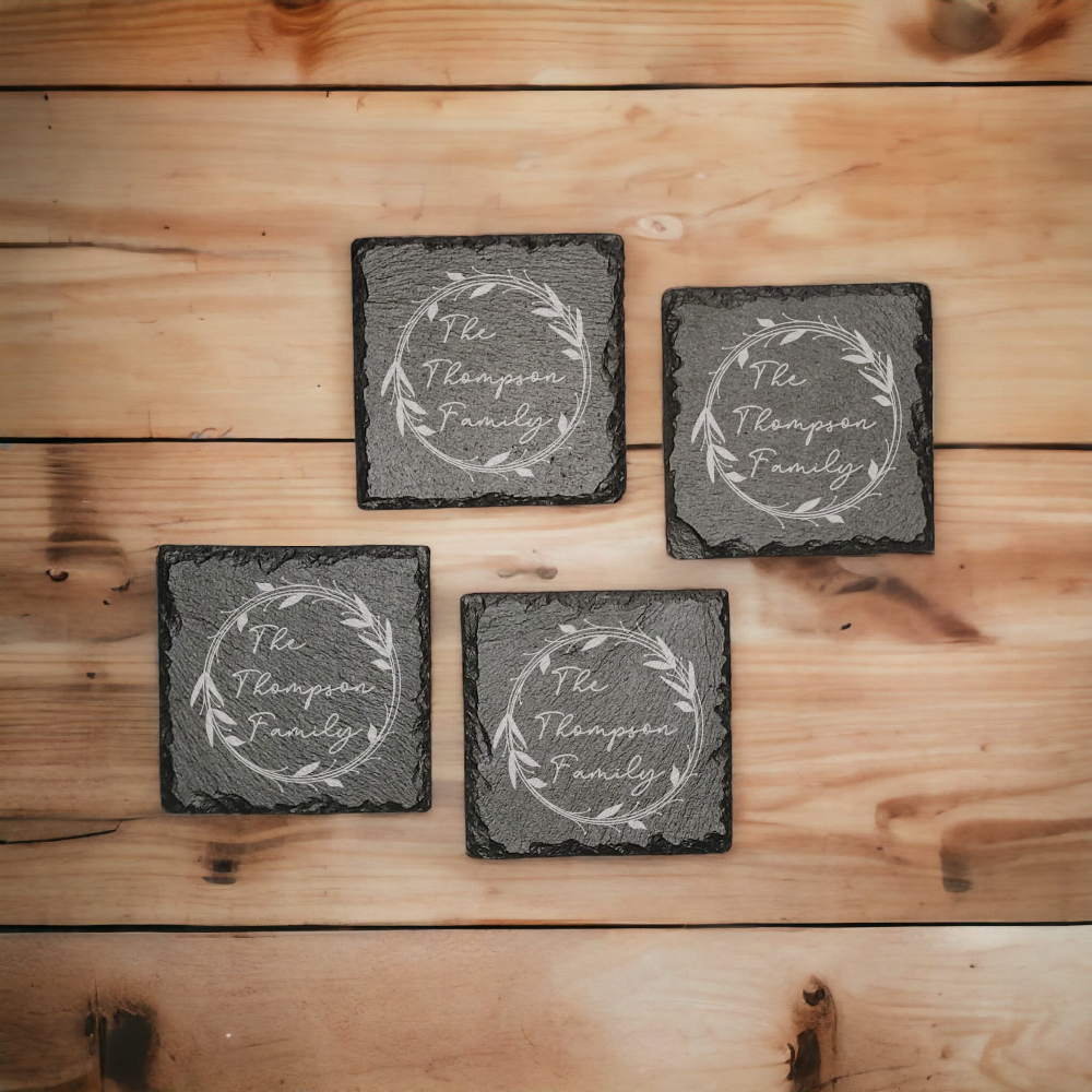 Family name monogram (Style 1) on set of 4 slate coasters with font of your choice